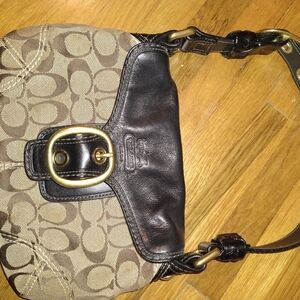 Elegant Coach Black and Tan Shoulder Bag